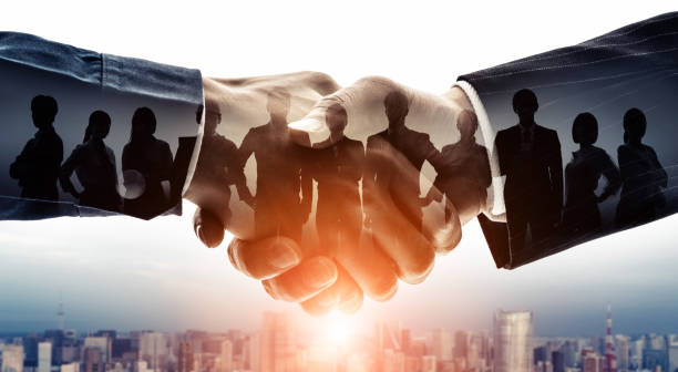 Handshake photo showing a united partnership of business concept.