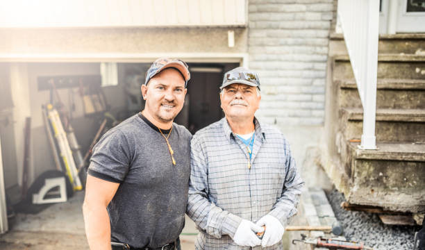 Pic of father and son construction business owners at job site