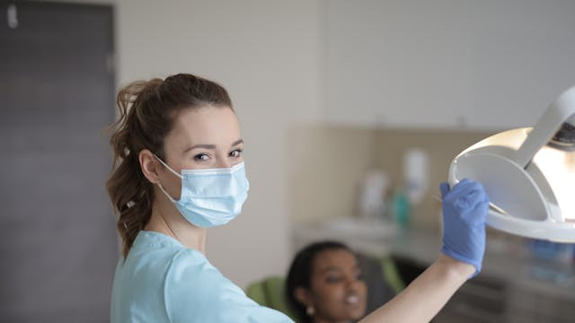 Pic of dental assistant with patient at Dental Clinic