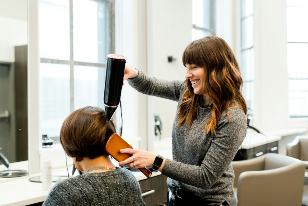 Pic of salon shop owner with client